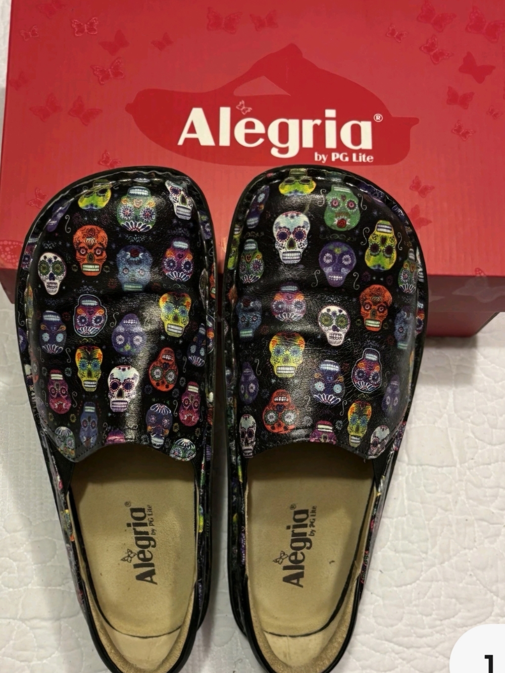 Alegria Womens Black Sugar Skull Slip-On Shoes